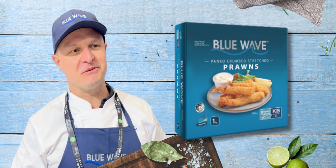 Simon on a blue background with Panko Crumbed Stretched Prawns